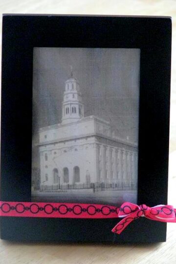 black frame with silver leaf temple image
