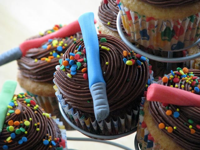 edible lightsabers on cupcakes (close up)