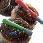 edible light sabers on cupcakes