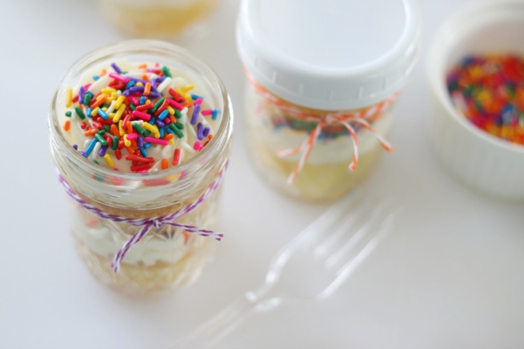 open jar with cupcakes and frosting inside