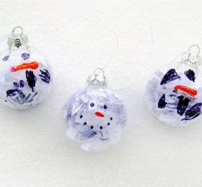 3 snowman ornaments with white background