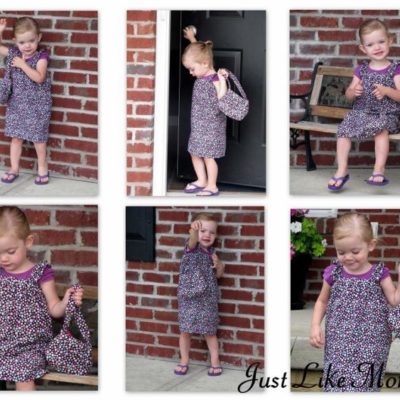 little girl holding tiny fabric purse