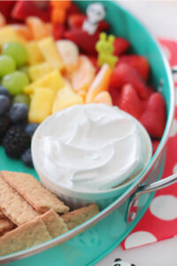 graham crackers and cool whip with fruit platter