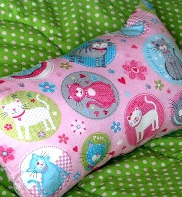 pink pillow with cat print