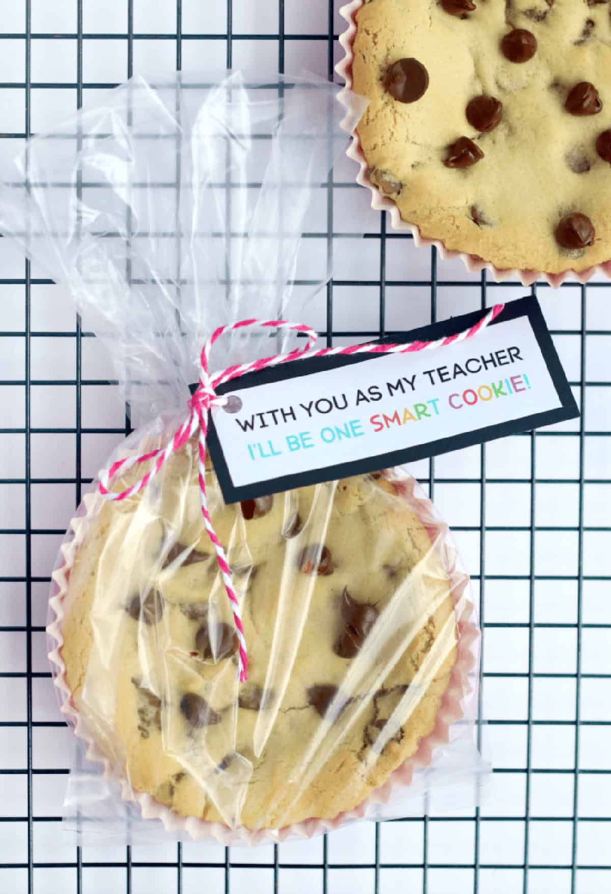 Deep dish cookie wrapped in plastic with a printble tag.