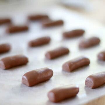tootsie rolls on baking sheet