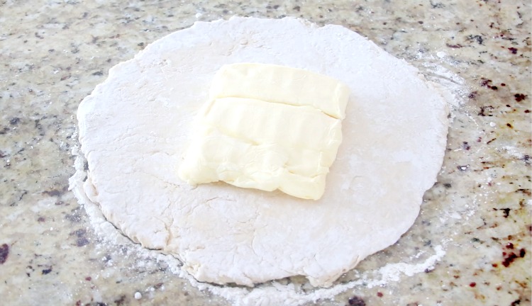 puff pastry rolled out with a square of butter on top