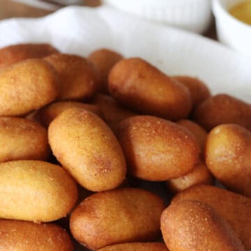 corn dog bites on paper towel lined plate