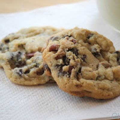 cookies on napkin with glass of milk