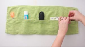 travel toiletries inside hand towel