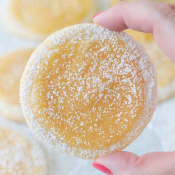 hand holding lemon bar cookie