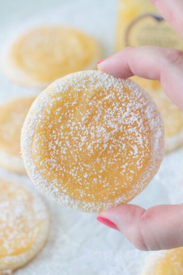 hand holding lemon bar cookie