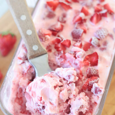 homemade strawberry ice cream in freezer dish