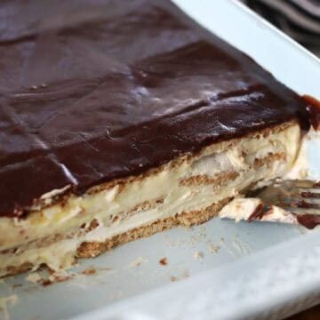 layered eclair dessert in dish and cut into portions