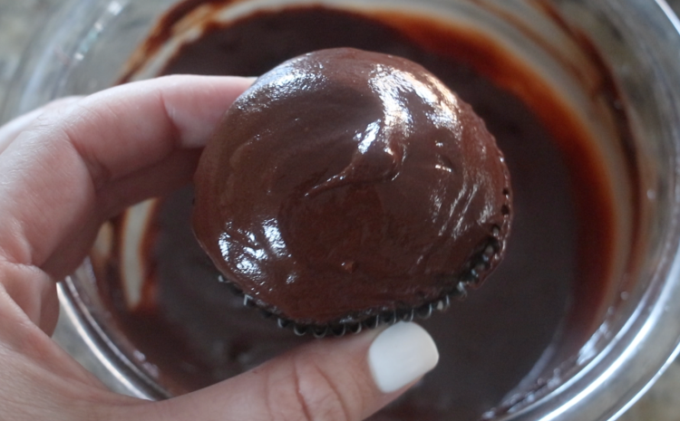 cupcake dipped in chocolate ganache