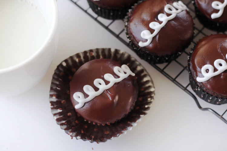 unwrapped easy hostess cupcake next to mug of milk