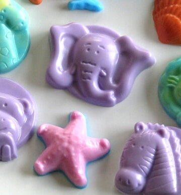 kids glycerin soaps on white plate