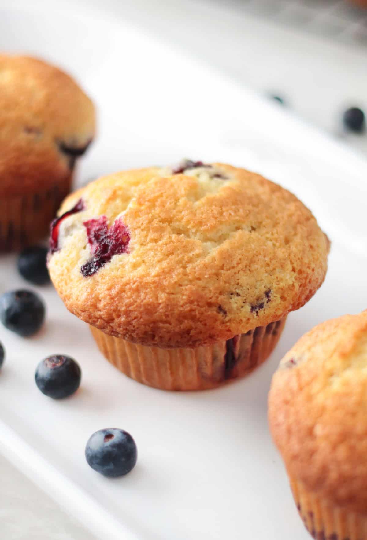 Blueberry muffins on platter.