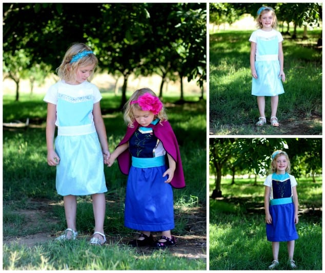 two little girls wearing Elsa and Anna aprons