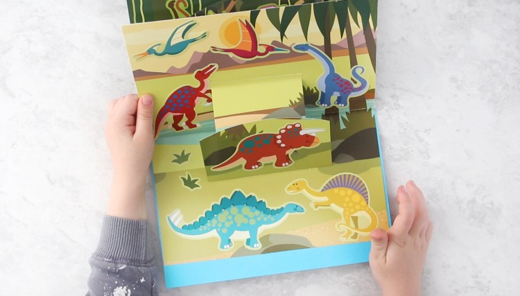 pop up book open to dinosaur page