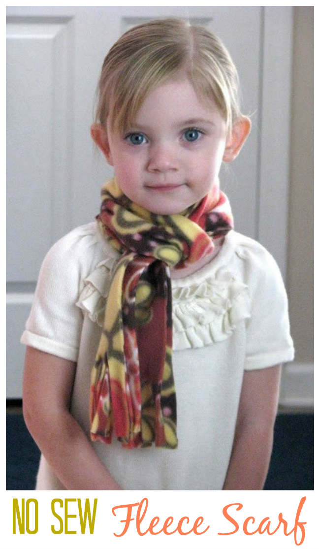 little girl wearing fleece scarf