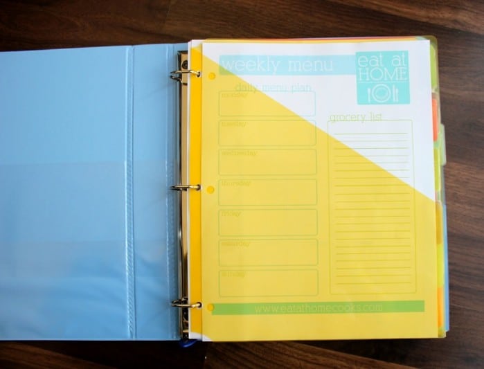 open binder and yellow envelope folder
