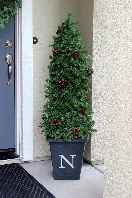 evergreen topiary on front porch