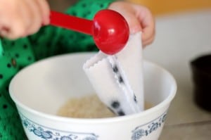 adding rice to hand wamer