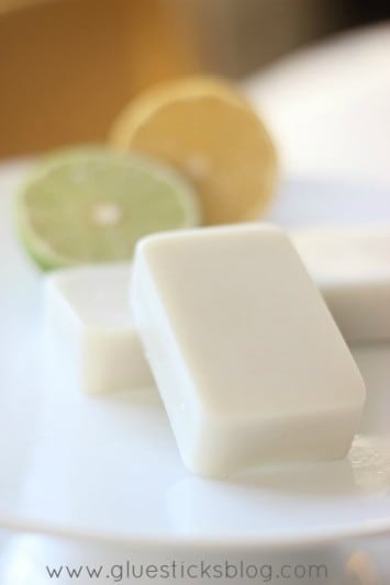two lotion bars on a white platter