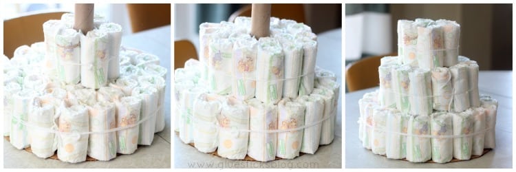 An April Showers diaper cake for a springtime baby shower. Complete with diapers, shoes, and receiving blankets.