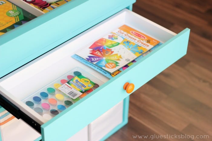 inside drawer with art supplies