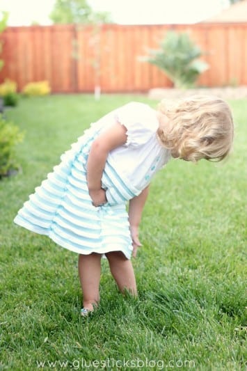 toddler in ruffled dress