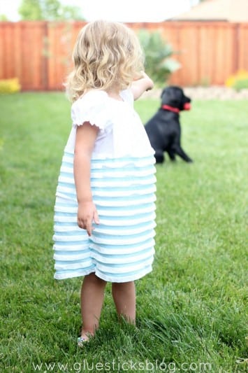 toddler in ruffled dress