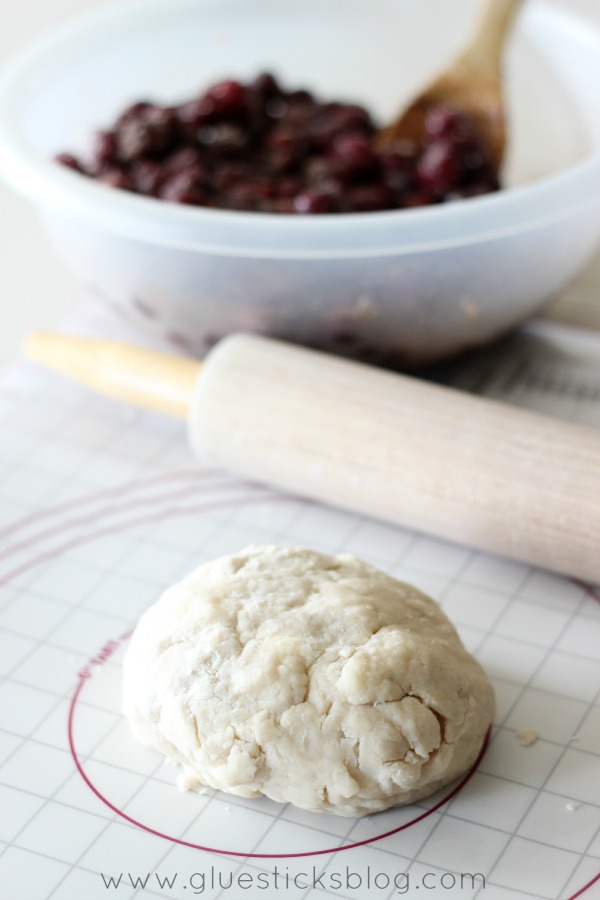 pie dough on counter next to rolling pin