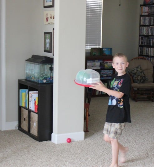 Phineas and Ferb Bucket List child holding green balloon that looks like a brain