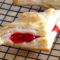 baked cherry turnover on cooling rack