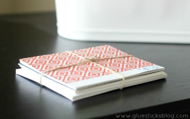 stack of cards tied with string