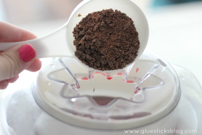 grated chocolate in measuring cup