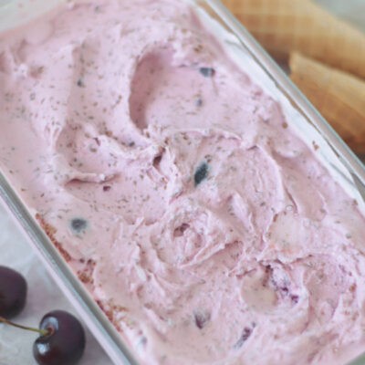 glass loaf pan full of cherry ice cream