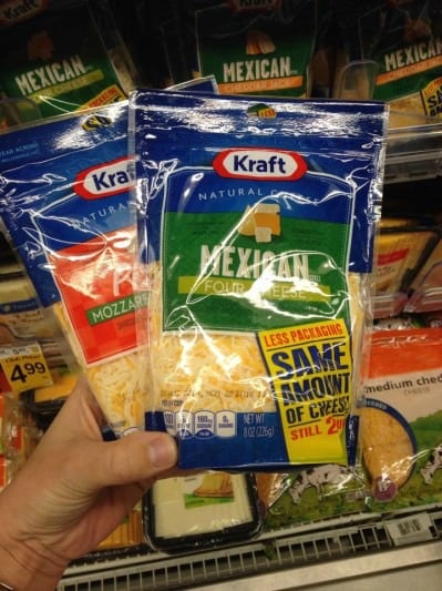 two packages of shredded cheese