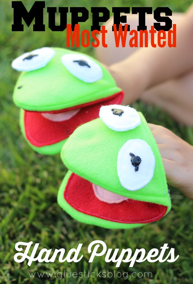 two kermit the frog hand puppets