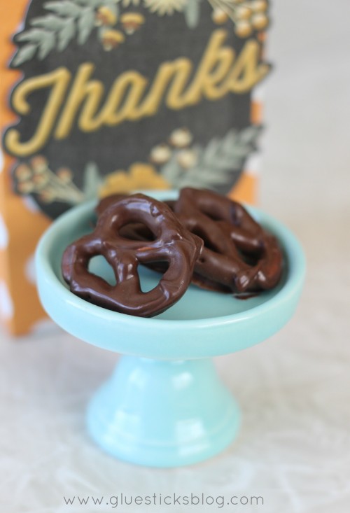 chocolate covered pretzels on small dessert stand