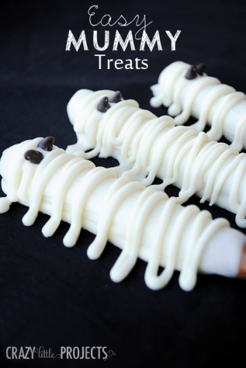 pretzels covered in white chocolate to look like mummies