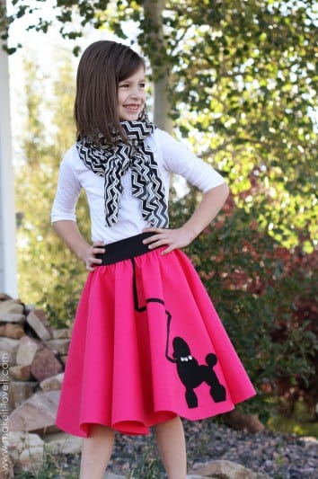 little girl in 50's poodle skirt costume