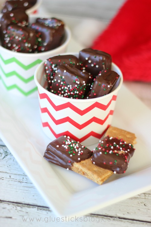 These chocolate dipped peanut butter graham crackers are just about the easiest dessert that you can make, but they are a FAVORITE over here! Sometimes we'll use other crackers like Club or Ritz, but the result is always the same. Delish!