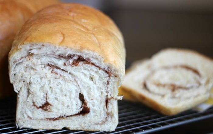 This cinnamon bread recipe is perfect for cinnamon toast, or to bake for gifts! Swirled cinnamon goodness, your family will thank you!