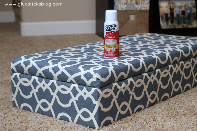 These step by step photos will show you how to reupholster a storage ottoman the quick and easy way! Breathe new life into an old ottoman with new fabric! This two hour project is great for beginners.