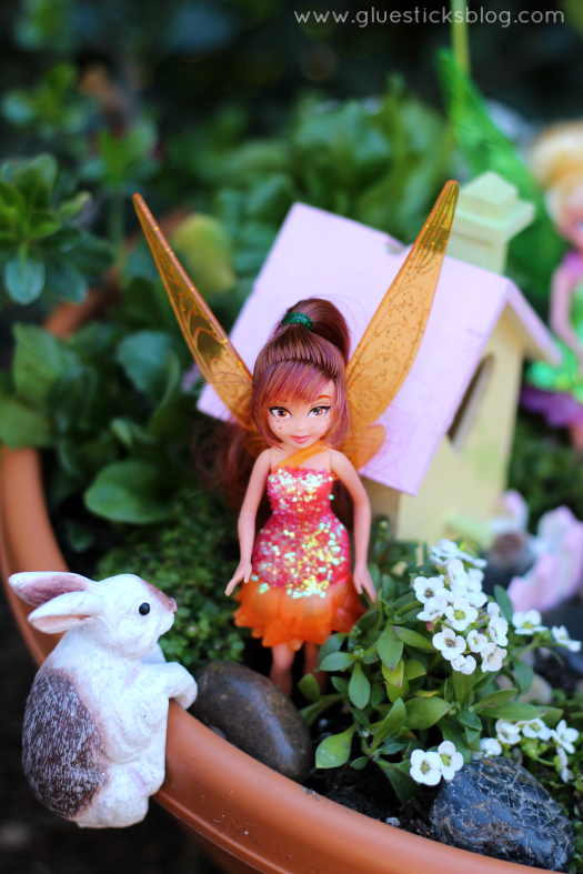 Faith, trust, and pixie dust are all you need to create a Pixie Hollow Fairy Garden. And maybe a pot, a few accessories and some flowers.