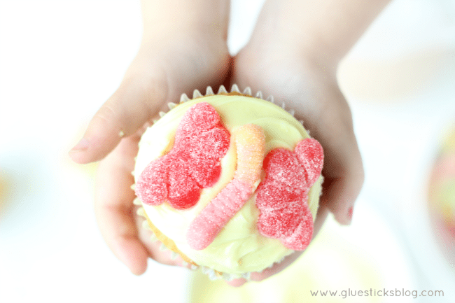 butterfly cupcake with yellow frosting