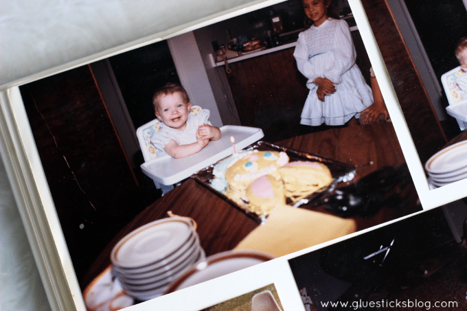 old photo of baby in high chair and bunny cake